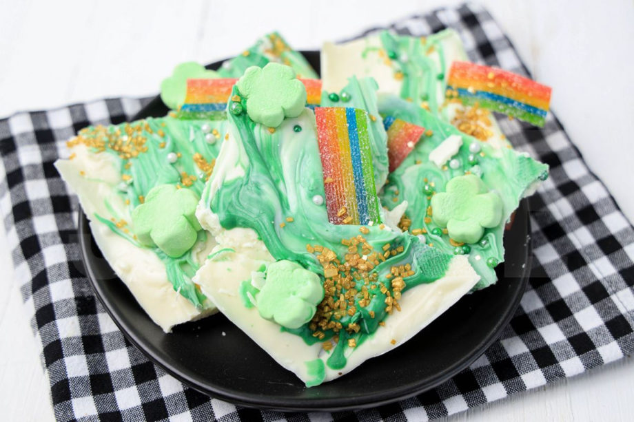 The Leprechaun Bark comes on a black plate with a plaid napkin on a white wood backdrop.