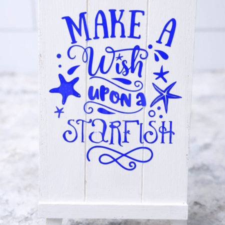 The Make A Wish Starfish Cricut Dollar Tree DIY comes pictured on a marble backdrop.