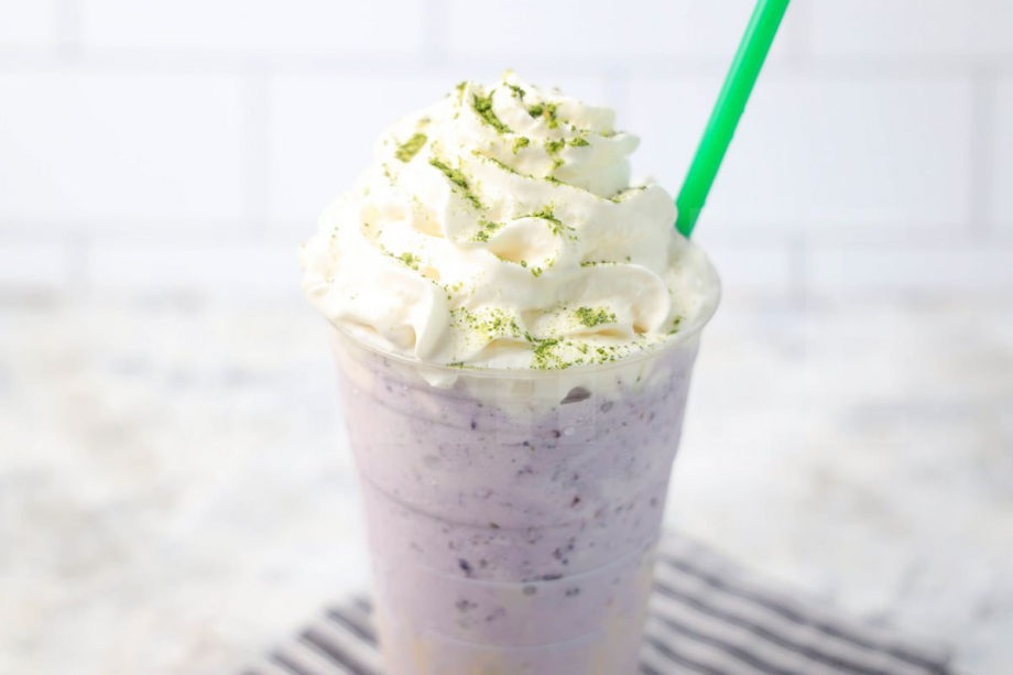 The Halloween Frappuccino Starbucks Copycat comes in a venti cup with a gray striped napkin on a marble backdrop.