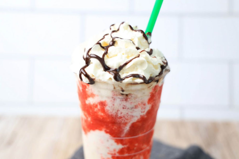 The IT Frappuccino Starbucks Copycat comes in a venti cup with a denim napkin on a rustic wood backdrop.