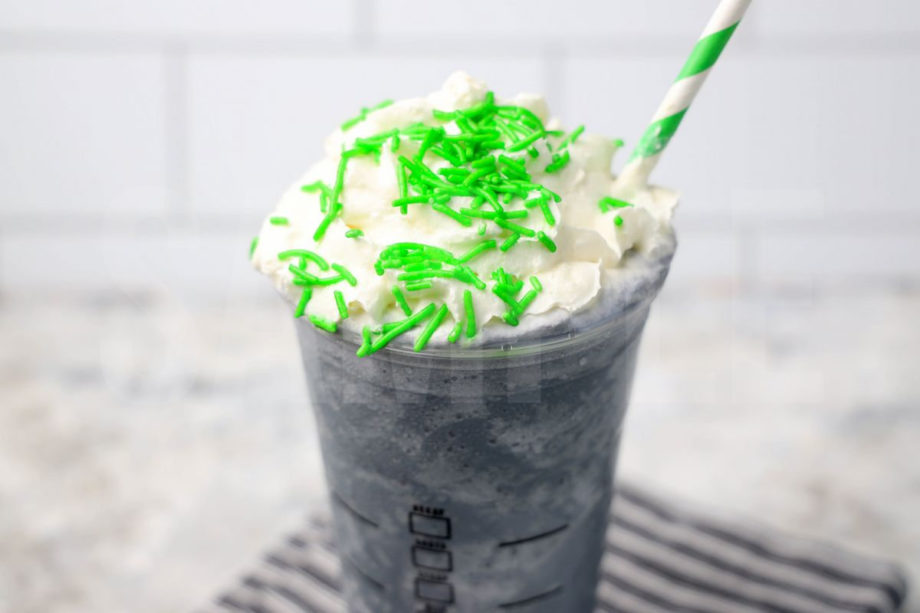 The Beetlejuice Frappuccino Starbucks Copycat comes in a venti cup with a gray striped napkin on a marble backdrop.